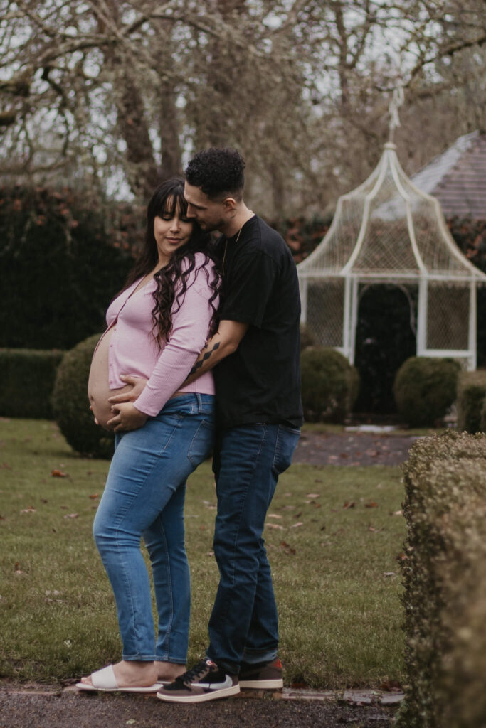 Maternity session in front of charming gazebo.